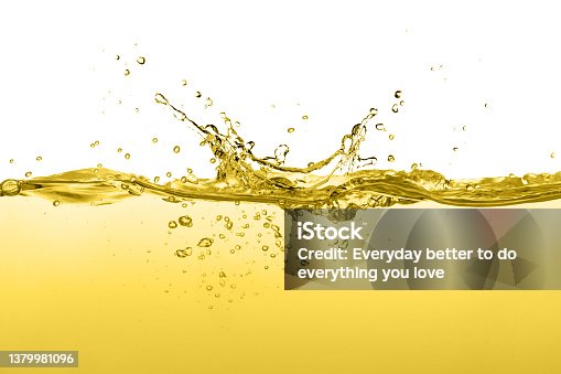 istock Cooking oil splash isolated on white 1379981096