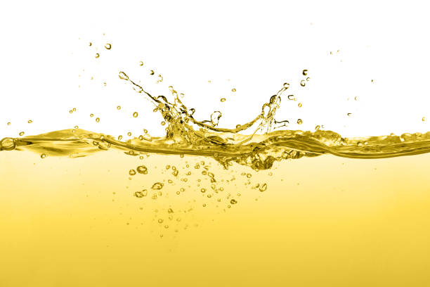 Cooking oil splash isolated on white Cooking oil with air bubble splash isolated on white background. lubrication stock pictures, royalty-free photos & images