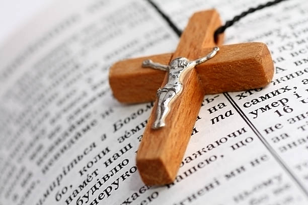 istock Holy Bible and cross 137998393