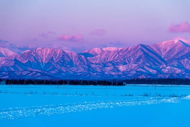 Winter scenery of Hidaka mountains in the early morning. There were red mountains there . hidaka mountains stock pictures, royalty-free photos & images