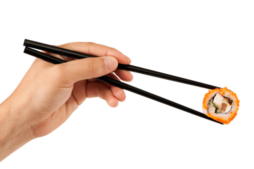 Japanese food. Roll sticks in Chinese isolated on a white background