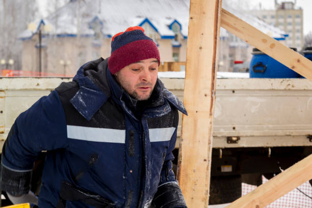 istock Close-up portrait of a worker at a construction site 1380013015