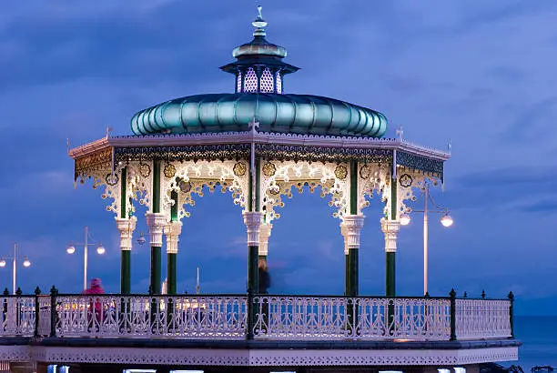 Illuminated bandstand on Brighton seafront England UK