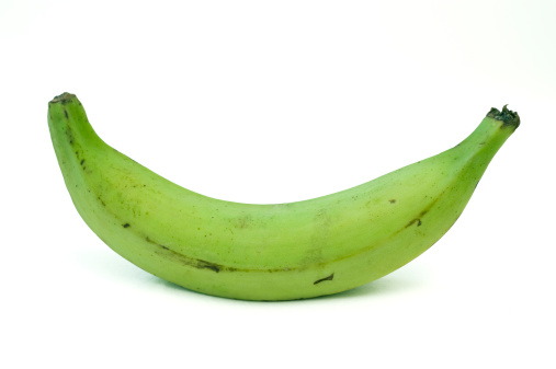 Green banana fruits in the market