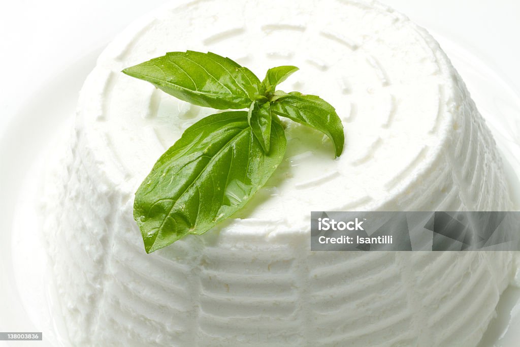 ricotta fresh ricotta with basil leaf Ricotta Stock Photo