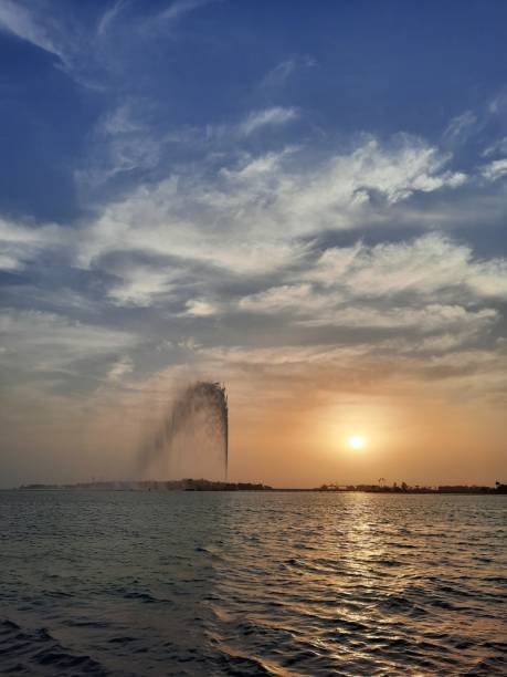 Stunning Sunset at Jeddah Corniche The Jeddah Corniche, also known as the Jeddah Waterfront, is a 30 km coastal resort area of the city of Jeddah, Saudi Arabia. Located along the Red Sea. saudi arabia jeddah landscape stock pictures, royalty-free photos & images