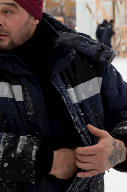istock Close-up portrait of a worker at a construction site 1380055223