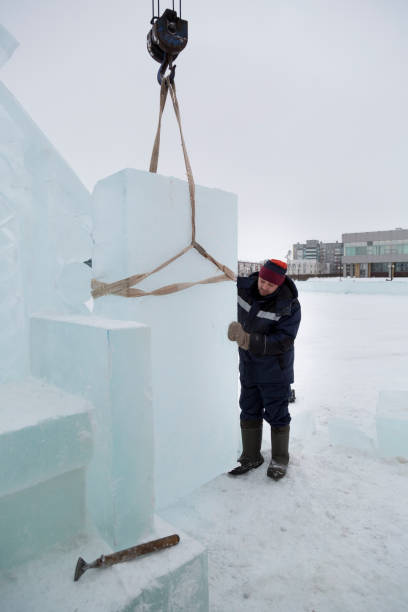 istock Worker on the installation of an ice panel 1380055781