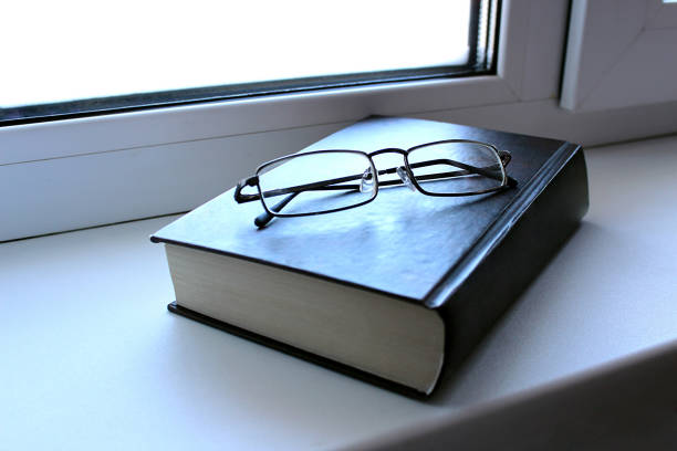 istock Read the book is on the windowsill 1380069101