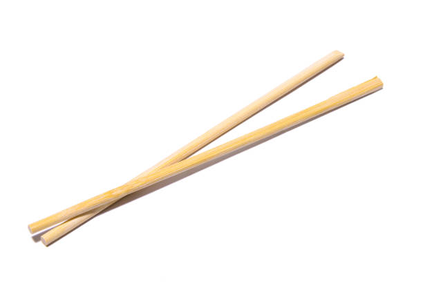 istock Wooden chopsticks isolated on white background 1380091262