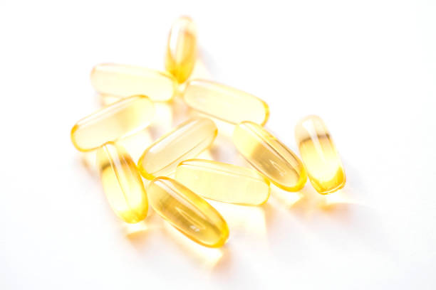 istock Yellow tablets fish oil for human heart 1380110644