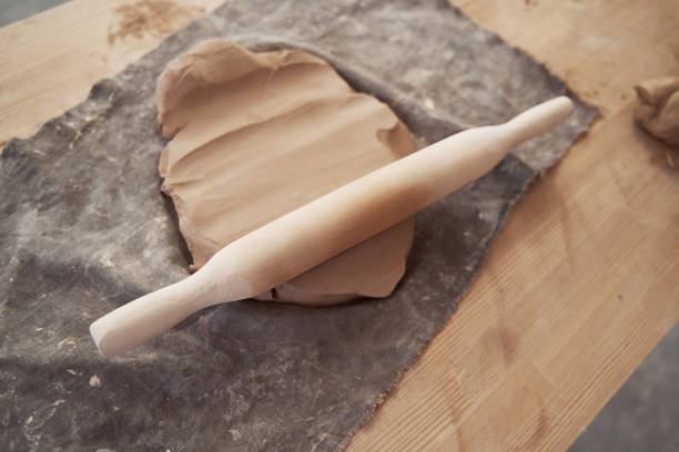 istock Used pottery tool left on rolled-out clay slab 1380115390