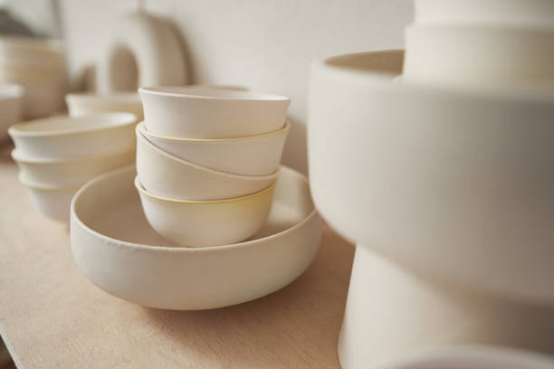 istock Round ceramic dish and teabowls in pottery studio 1380115983