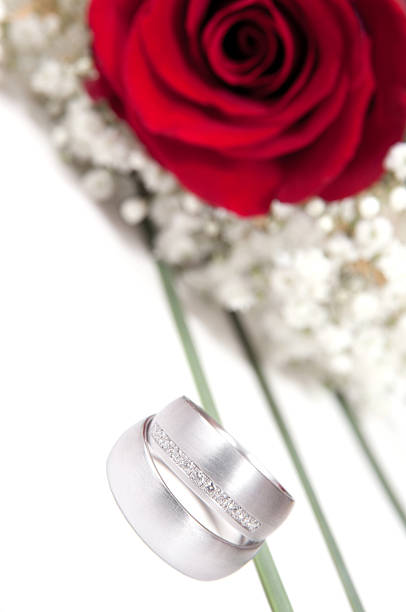 istock red rose, wedding ring and gypsohila 138013824