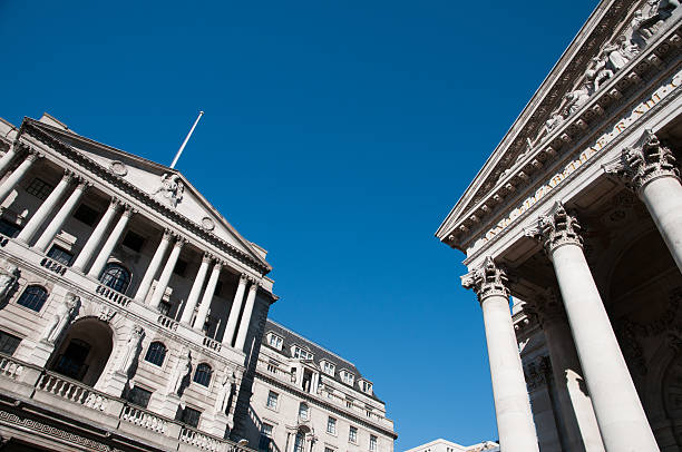 financial institutions British finance with the Bank of England to the left and the old London Stock Exchange to the right. bank of england stock pictures, royalty-free photos & images
