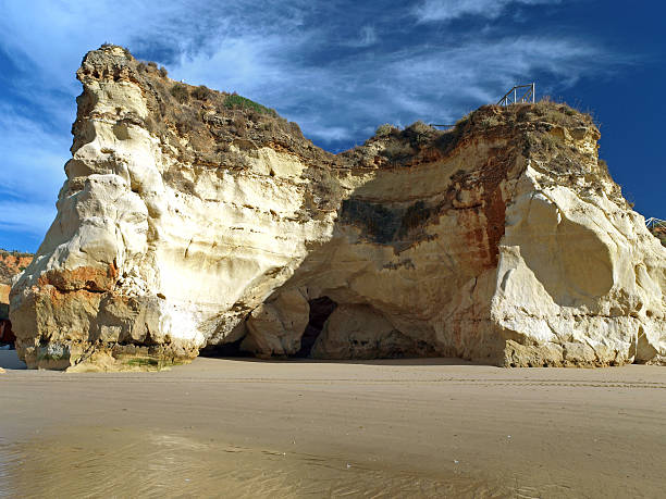 istock Caves and colourful rock formations on the Algarve coast 138014943