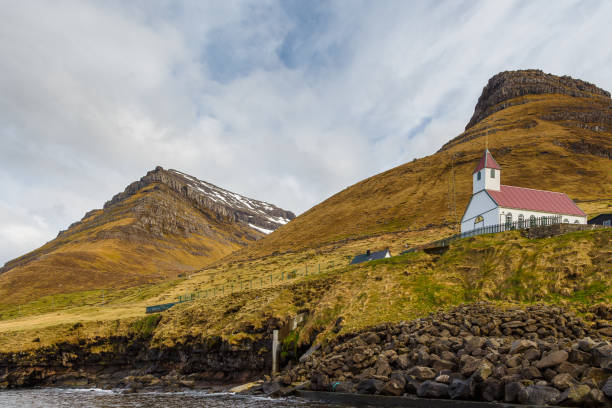 istock Kunoy Church on a hill. Faroe Islands. 1380157550