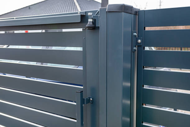 istock Modern sliding entrance gate in anthracite color, visible upper guide rollers. 1380158977