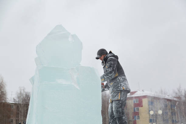 istock The wizard cuts figures from the ice chainsaw 1380173310