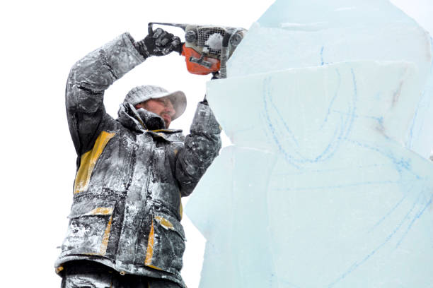 istock The wizard cuts figures from the ice chainsaw 1380173324