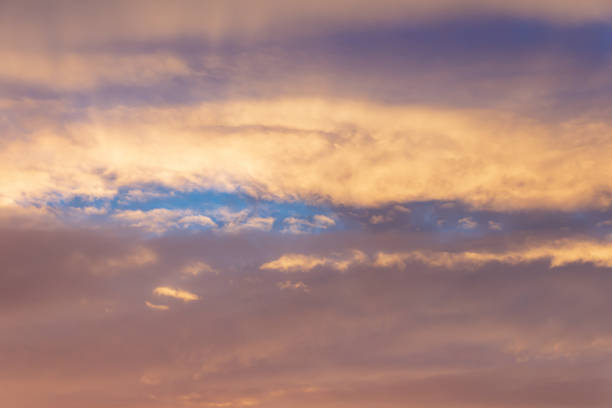 Beautiful sunset sky above clouds.