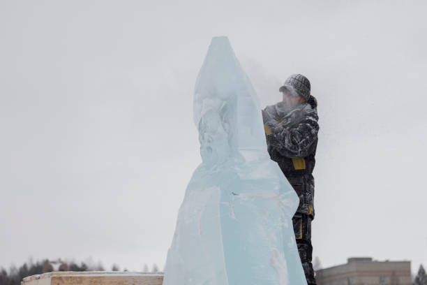 istock Portrait of a sculptor with a chainsaw at work 1380174041