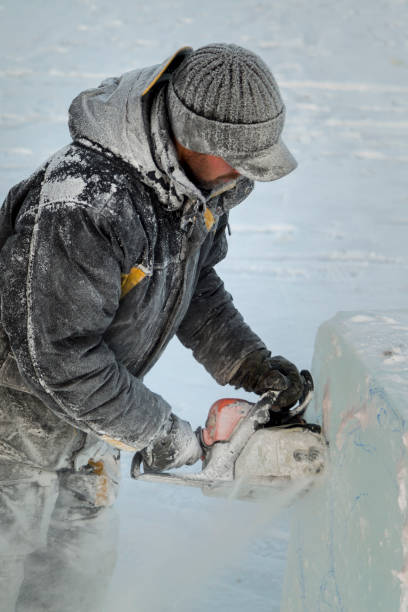 istock The wizard cuts figures from the ice chainsaw 1380178654