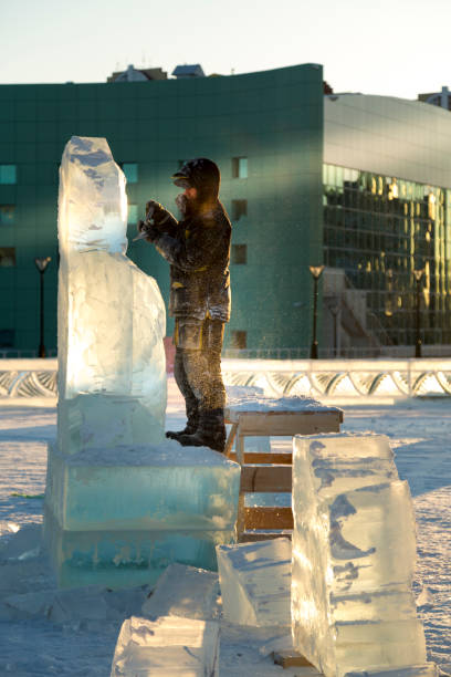 istock The wizard cuts figures from the ice chainsaw 1380179735
