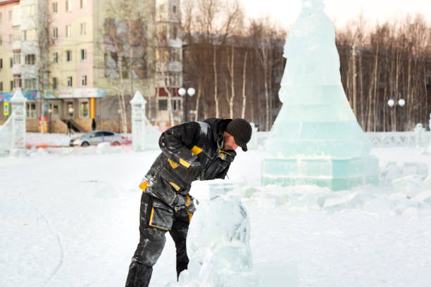 istock The wizard cuts figures from the ice chainsaw 1380179758