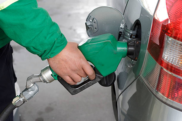 istock Refueling Automobile With Gasoline Pump Nozzle 138018120