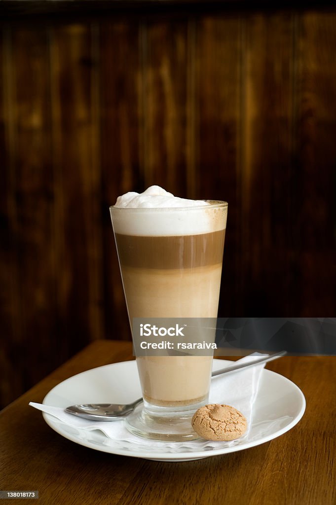 Coffee Coffee in a glass cup on a wood table Coffee - Drink Stock Photo