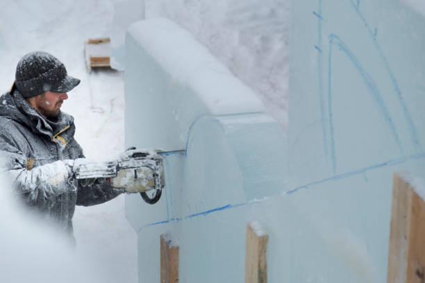 istock The sculptor carves a graceful composition on the ice panel 1380183915
