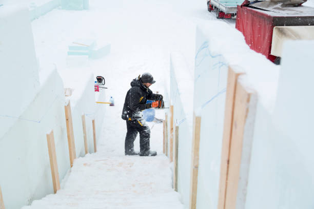 istock The sculptor carves a graceful composition on the ice panel 1380183919