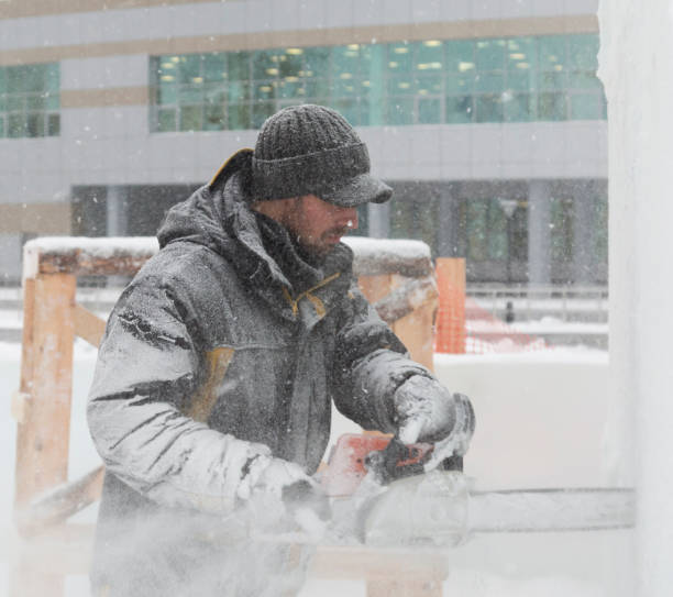 istock The sculptor carves a graceful composition on the ice panel 1380196902