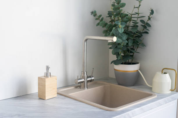 istock Concept of eco friendly kitchen supplies, using zero waste sponge, standing on kitchen, near wooden biodegradable brush 1380209591