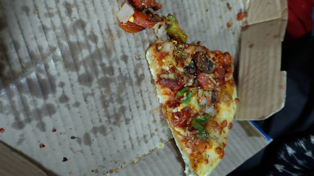 istock a bite of Pizza Indian food pizza 1380218036