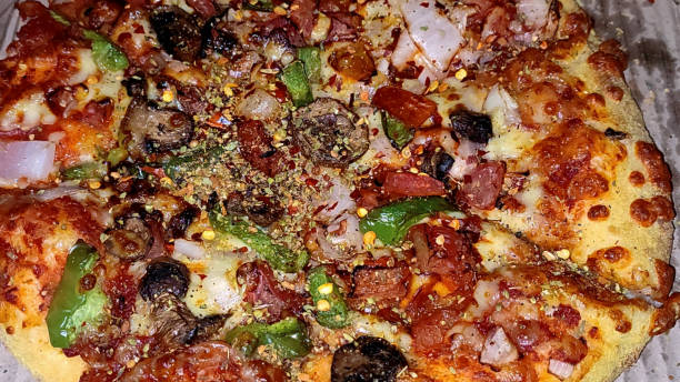 istock a bite of Pizza Indian food pizza 1380218046