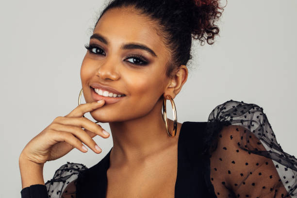 istock Beautiful afro woman with perfect make-up 1380225327