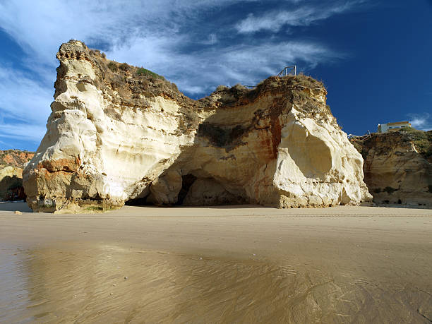 istock Caves and colourful rock formations on the Algarve coast 138023237