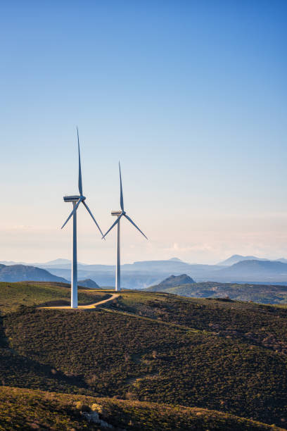 istock Turbines in a mountain wind farm. Ecological energy production. 1380235318
