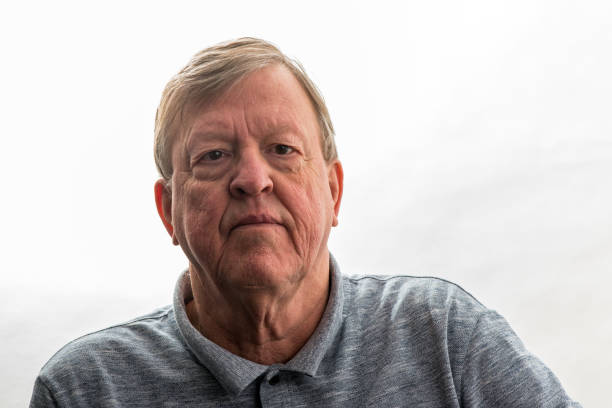 istock Portrait of an older man with lips closed 1380243850