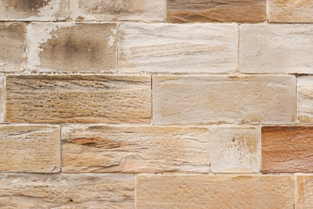istock Part of an old sandstone brick wall 1380244374