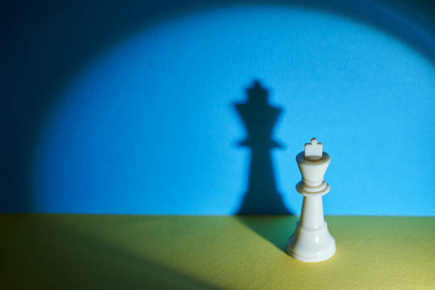 istock king chess piece on blue and yellow background -ukraine flag color 1380246459