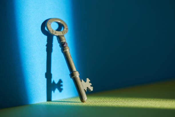 istock vintage key on blue and yellow background 1380247512