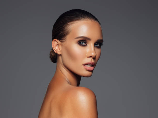 istock Beautiful emotional woman with perfect make-up 1380248042