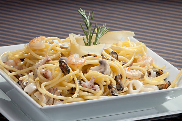 Italian pasta with seafood stock photo