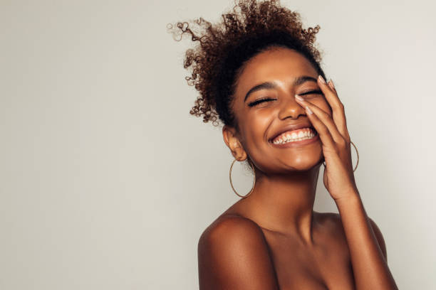 istock Beautiful afro girl with curly hairstyle 1380259077