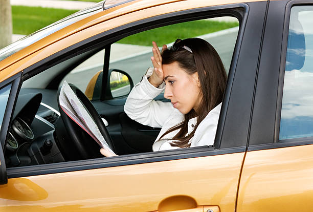 istock Female driver upset about paper 138025914