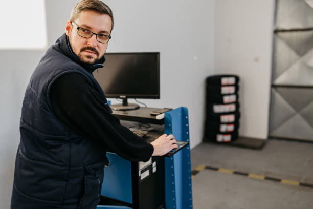 istock A technician, garage mechanic conducting diagnostic check of a car during regular warranty maintenance 1380262273