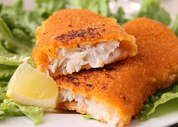 fried fish fried fish and salad fish stick stock pictures, royalty-free photos & images